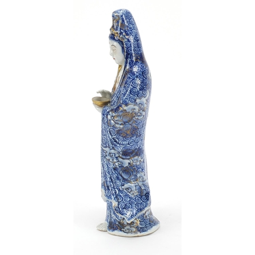 1858 - Japanese porcelain figure of a female holding a bowl, 26.5cm high