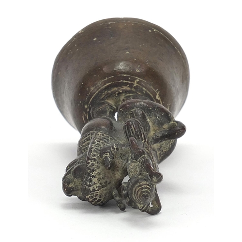 1805 - Indian bronze bell in the form of a deity on mythical animal, 12cm high