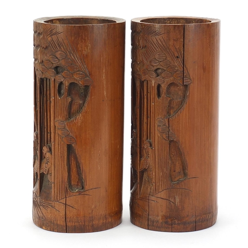 450 - Pair of Chinese bamboo brush pots carved with figures, each 24cm high