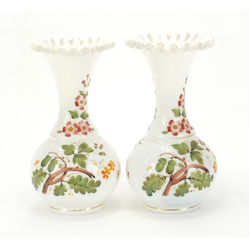 415 - Pair of 19th century white opaline glass vases hand painted with fruit and berries, each 25cm high