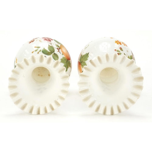 415 - Pair of 19th century white opaline glass vases hand painted with fruit and berries, each 25cm high