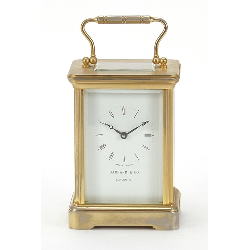 80 - Garrard & Co, brass cased carriage clock with Roman numerals, 11.5cm high