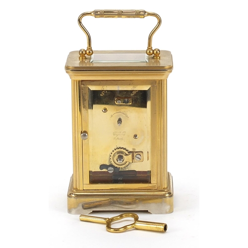 80 - Garrard & Co, brass cased carriage clock with Roman numerals, 11.5cm high