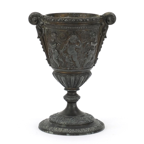 1802 - 19th century classical bronze vase decorated in relief with Putti, 23cm high