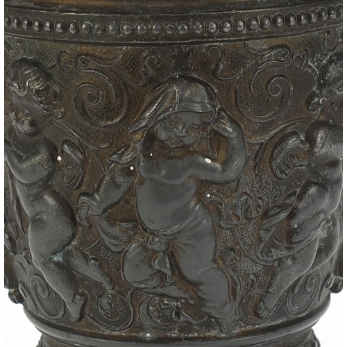 1802 - 19th century classical bronze vase decorated in relief with Putti, 23cm high