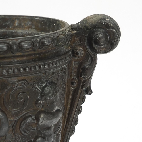 1802 - 19th century classical bronze vase decorated in relief with Putti, 23cm high