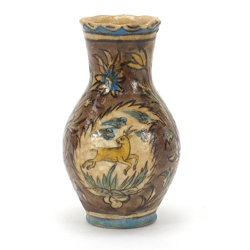 1846 - Islamic Iznik pottery vase hand painted with animals and flowers, 17.5cm high