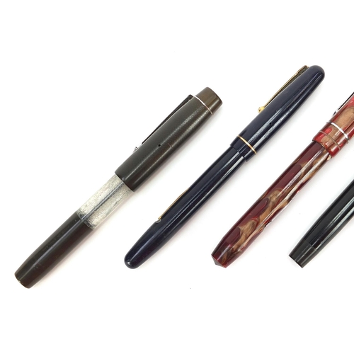 111 - Five vintage fountain pens, four with gold nibs including two marbleised and a Swan self-filler