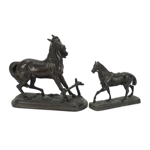 1901 - Two patinated spelter horses, the largest 21cm wide