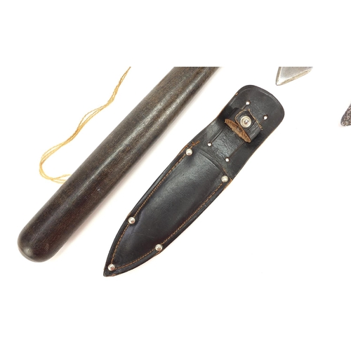 1897 - Two military interest hunting knives including one with a leather sheath and a Police truncheon, the... 