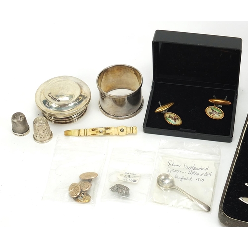 2002 - Objects including six silver handled butter knives, two silver thimbles and a pair of horseracing in... 