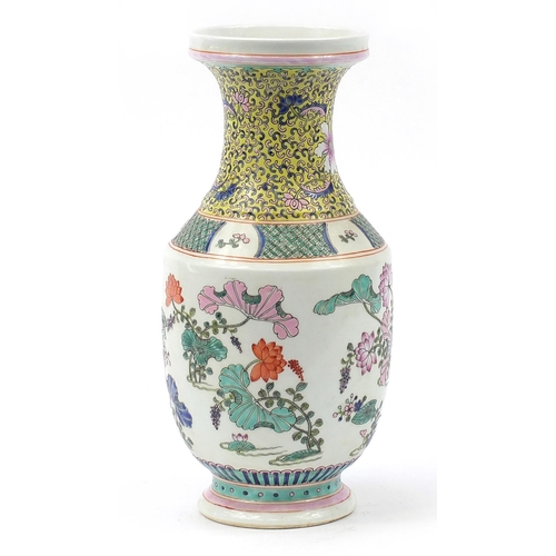 1868 - Chinese porcelain vase hand painted in the famille rose palette with flowers, six figure character m... 