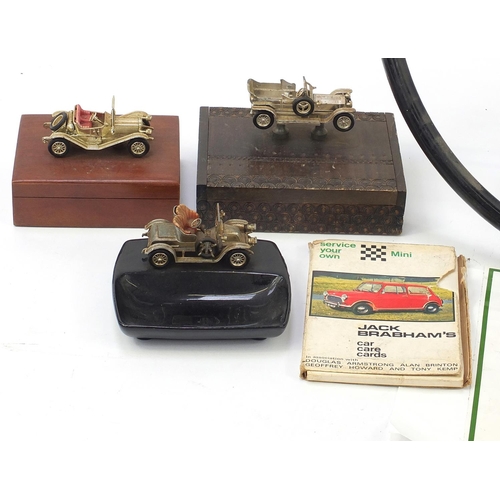 853 - Vintage car automobilia including a Rover steering wheel, Jaguar chrome car mascot and Royal British... 