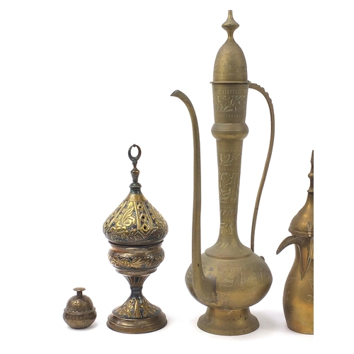 2021 - Middle Eastern metalware including a Turkish incense burner and coffee pots, the largest 60cm high