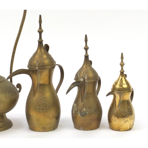 2021 - Middle Eastern metalware including a Turkish incense burner and coffee pots, the largest 60cm high