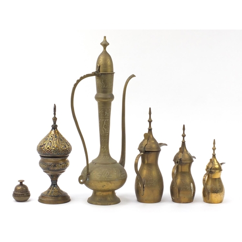 2021 - Middle Eastern metalware including a Turkish incense burner and coffee pots, the largest 60cm high