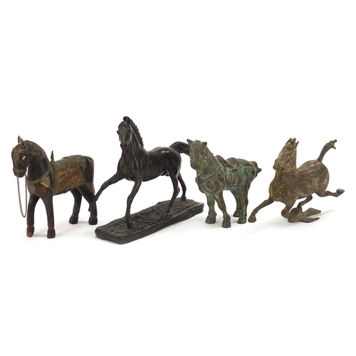 1902 - Four model horses including two Chinese archaic style examples, the largest 22cm in length