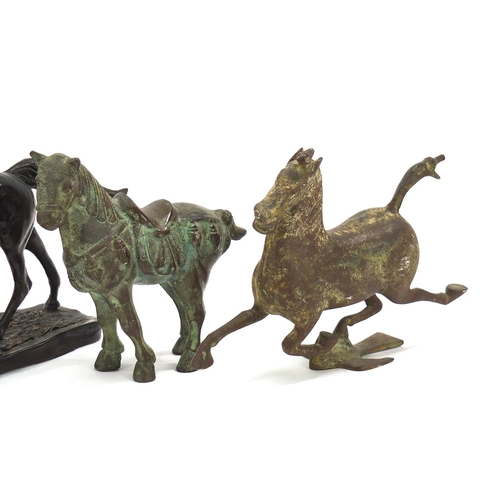 1902 - Four model horses including two Chinese archaic style examples, the largest 22cm in length