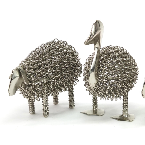 1827 - Three white metal animals comprising two sheep and a duck the largest 14cm high