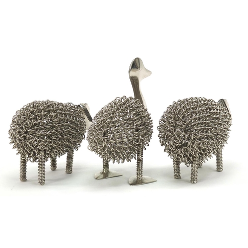 1827 - Three white metal animals comprising two sheep and a duck the largest 14cm high