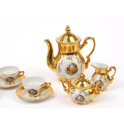 1017 - Bavaria gilt porcelain six place tea service with teapot, the teapot 18cm high