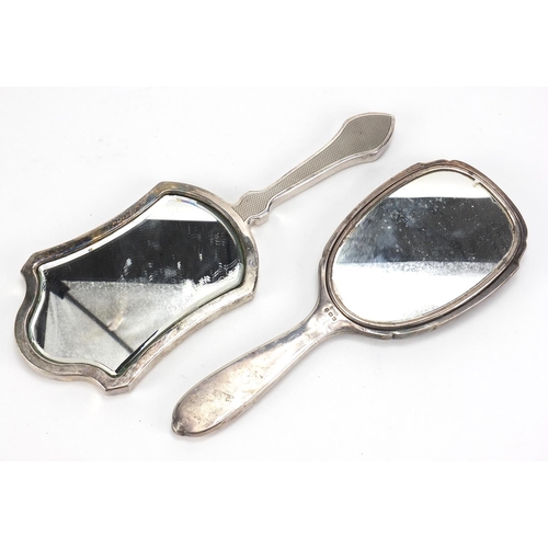 944 - Two silver hand mirrors including one with tortoiseshell back, Birmingham 1929 and London 1933, the ... 