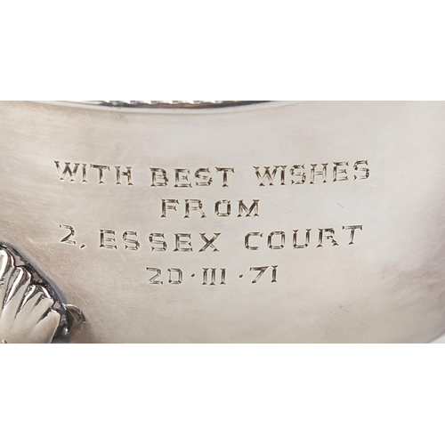 85 - Silver sauce boat raised on three hoof feet, Birmingham, 1932, 15cm in length, 99.2g