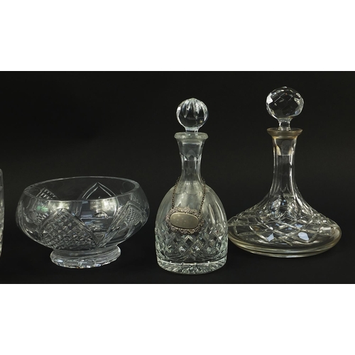 1009 - Cut crystal and glassware including three decanters and a Royal Doulton vase, the largest 25cm high