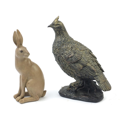 1011 - Decorative bronzed pheasant and a seated rabbit, the largest 35cm high