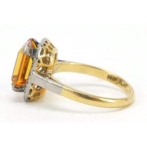 859 - 18ct gold orange stone and diamond ring, (tests as sapphire) size O, 4.6g