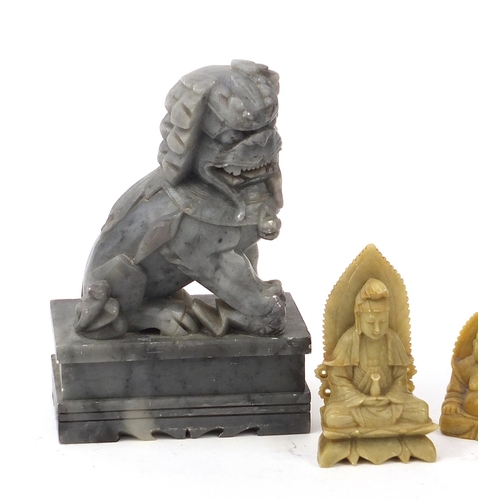 2548 - Chinese stone carvings including a pair of Foo dogs and a Buddha, the largest each 18cm high