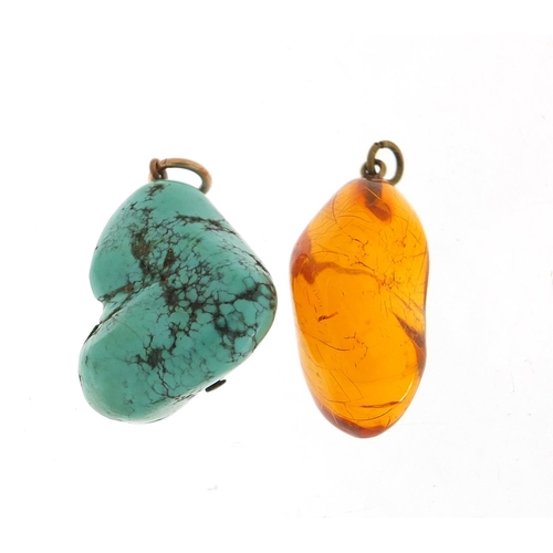 1820 - Two pendants comprising turquoise matrix and amber, 2.5cm and 3cm high, total 18.0g