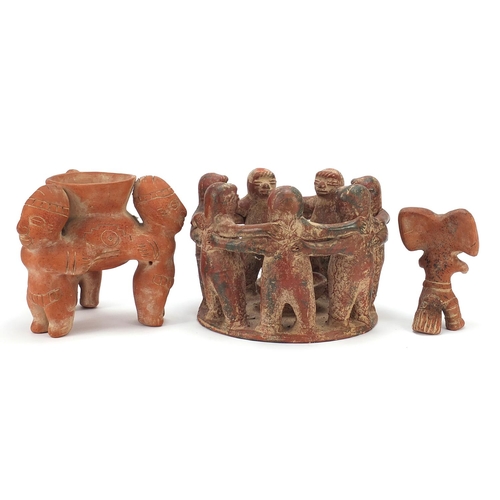 1927 - Peruvian terracotta pottery including a figural vase and figural candle holder, the largest 24cm in ... 