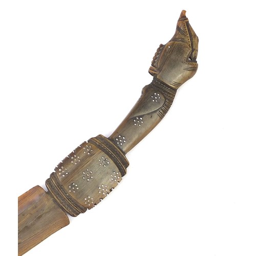 611 - Carved horn letter opener with dragon head handle and metal inlay, possibly rhinoceros, 38.5cm in le... 