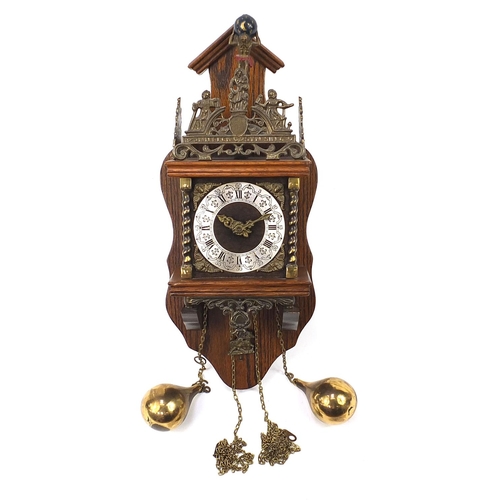 2564 - Oak atlas design wall hanging clock with pendulum and weight, the clock 50cm high