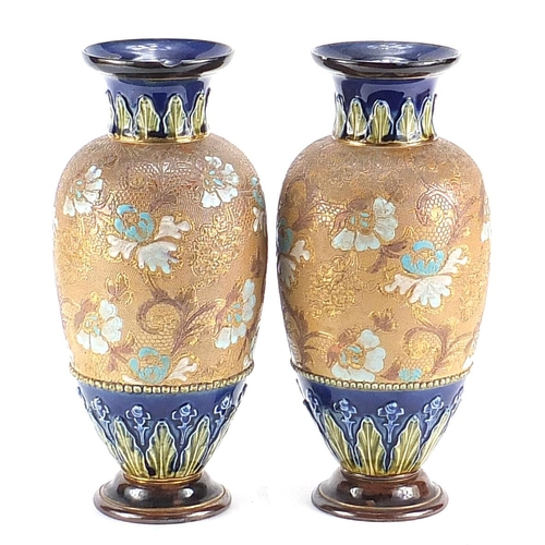 1829 - Large pair of Doulton Lambeth stoneware vases hand painted with flowers, each 31cm high