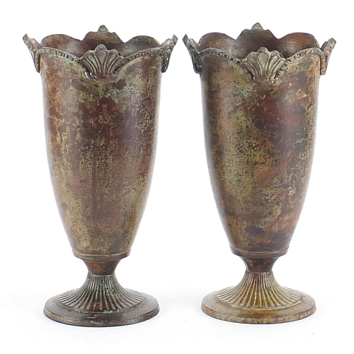 1921 - Pair of Rochamp bronzed metal classical vases with fluted bases, each 29.5cm high