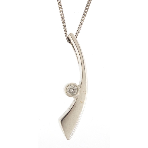 142 - 9ct white gold diamond pendant on a 9ct white gold necklace, 2.5cm high and 40cm in length, total 2.... 