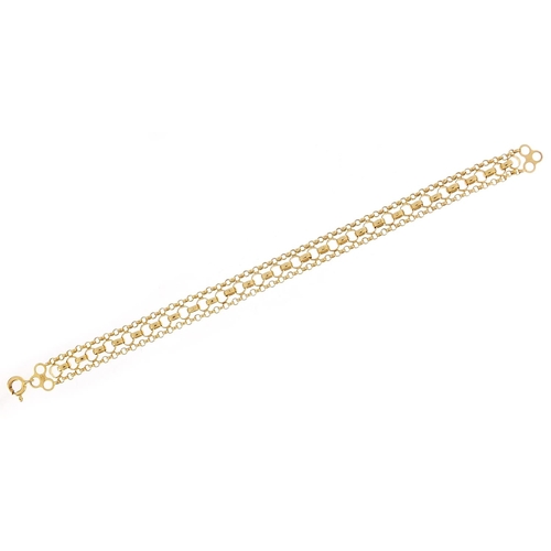 560 - 9ct gold multi link bracelet, 17cm in length, 6.0g