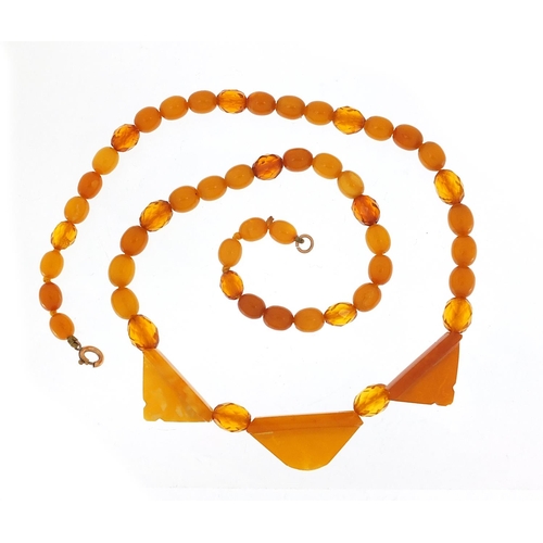 860 - Butterscotch amber coloured bead necklace, 50cm in length, 14.0g