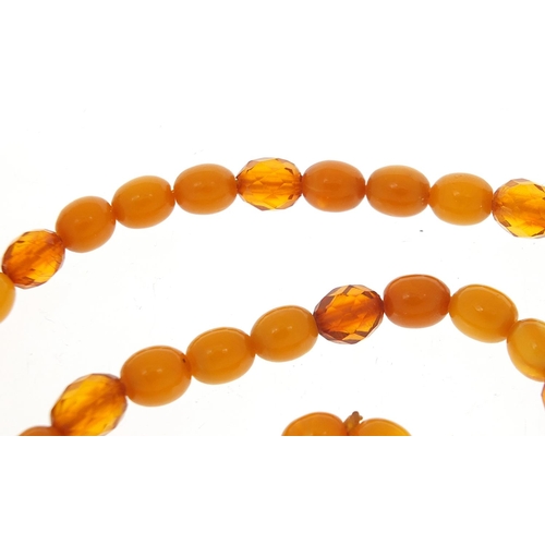 860 - Butterscotch amber coloured bead necklace, 50cm in length, 14.0g