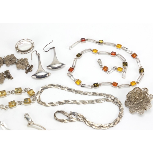 1823 - Silver jewellery including amber coloured necklace, hardstone brooches, bracelets and a pair of thre... 