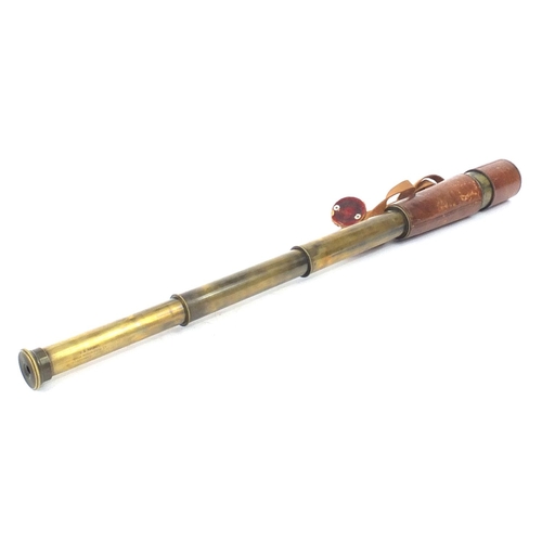 841 - Broadhurst, Clarkson & Co, three draw leather bound brass telescope, 26cm in length when closed