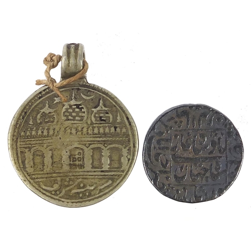 2566 - 13th century Arabian coin and one other, the largest 4cm high