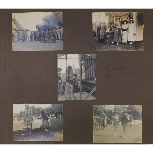 2550 - Early 20th century black and white photographs arranged in an album including Kent cricket, Ice skat... 