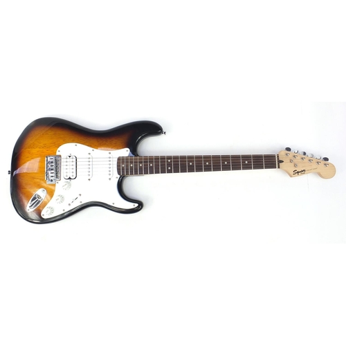 1760 - Squier Stratocaster by Fender bullet strapped six string electric guitar with case, 97.5cm in length