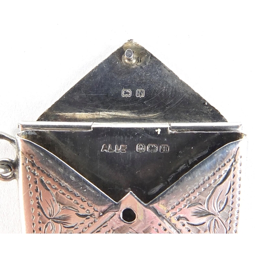 726 - Edwardian silver vesta and silver stamp case in the form of an envelope, the vesta hallmarked Cheste... 