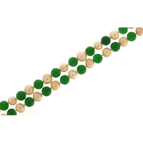 1993 - Chinese green jade and cultured pearl necklace, 120cm in length, 105.8g