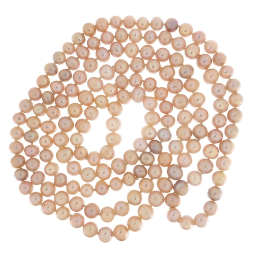 1854 - Freshwater pearl necklace, 120cm in length, each pearl approximately 7mm in diameter, 87.0g