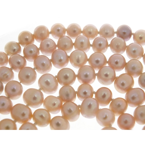 1854 - Freshwater pearl necklace, 120cm in length, each pearl approximately 7mm in diameter, 87.0g